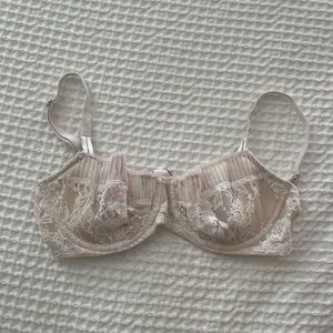 cream unlined bra with gold shimmers! 32D barely worn